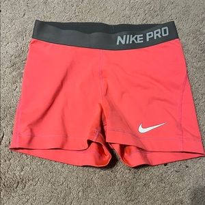 Nike Pros coral color. Adult Small